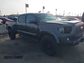 2021 Toyota Tacoma 4WD SR5 with VIN 3TMDZ5BN2MM108586, listed as a IAAI auction lot 41604953 with 65,422 mi miles. Bid and sale history available at carsss.com. Image 13.