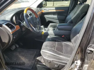 2013 Jeep Grand Cherokee Overland with VIN 1C4RJFCG5DC638927, listed as a Copart auction lot 52752615 with 117,494 mi miles and Salvage Title. Bid and sale history available at carsss.com. Image 7.