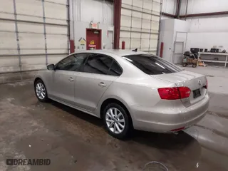 2014 Volkswagen Jetta Sedan SE with VIN 3VWD17AJ9EM241667, listed as a IAAI auction lot 41657090 with 114,641 mi miles. Bid and sale history available at carsss.com. Image 3.