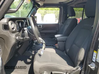 2018 Jeep Wrangler Unlimited Sahara with VIN 1C4HJXEGXJW229881, listed as a Copart auction lot 58762775 with 82,470 mi miles and Salvage title. Bid and sale history available at DreamBid. Image 7.