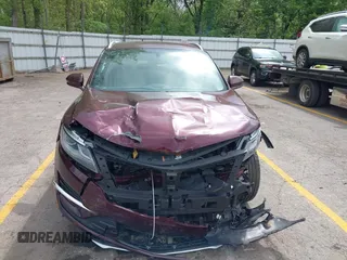 2018 Lincoln MKC Premiere z VIN 5LMCJ1C98JUL30207, wystawiony jako IAAI lot #42275853 z przebiegiem 51 206 mil mil oraz . Historia ofert i sprzedaży dostępna na DreamBid. Obrazek 13.