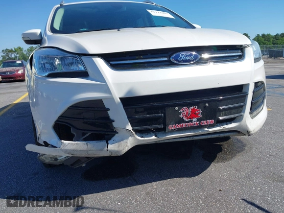2014 Ford Escape Titanium с VIN 1FMCU0J94EUB92694, выставлен на аукционе IAAI как лот 42124647 с пробегом 107 666 миль миль и . История ставок и продаж доступна на DreamBid. Изображение 6.