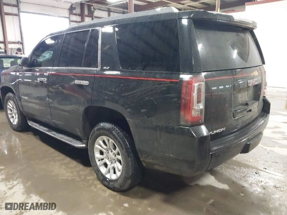 2017 GMC Yukon SLT with VIN 1GKS2BKC0HR147128, listed as a IAAI auction lot 41226119 with 147,557 mi miles. Bid and sale history available at carsss.com. Image 3.