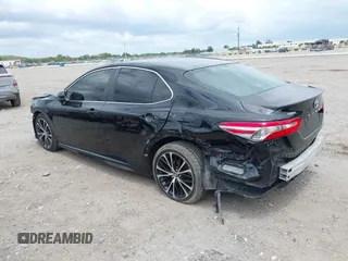 2018 Toyota Camry LE z VIN 4T1B11HK6JU158382, wystawiony jako IAAI lot #42185532 z przebiegiem 94 802 mil mil oraz . Historia ofert i sprzedaży dostępna na DreamBid. Obrazek 6.