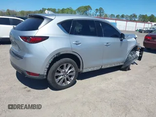2019 Mazda CX-5 Grand Touring with VIN JM3KFADM1K1606082, listed as a IAAI auction lot 41875878 with 66,089 mi miles. Bid and sale history available at carsss.com. Image 4.