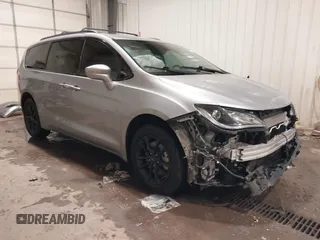 2020 Chrysler Pacifica Launch Edition z VIN 2C4RC3BG4LR263659, wystawiony jako IAAI lot #41590971 z przebiegiem 69 644 mil mil oraz . Historia ofert i sprzedaży dostępna na DreamBid. Obrazek 1.