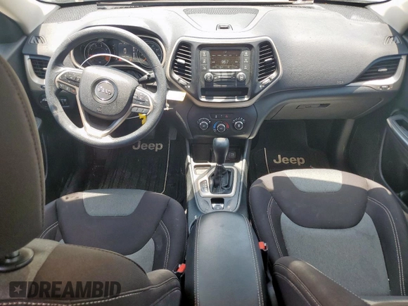 2015 Jeep Cherokee Sport with VIN 1C4PJLAB5FW684191, listed as a Copart auction lot 64256405 with 159,289 mi miles and Salvage title. Bid and sale history available at DreamBid. Image 8.