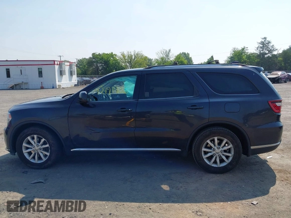 2015 Dodge Durango SXT with VIN 1C4RDHAG7FC869904, listed as a IAAI auction lot 42491906 with 120,396 mi miles and . Bid and sale history available at DreamBid. Image 14.