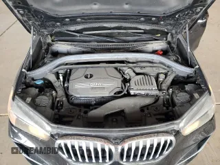 2021 BMW X1 sDrive28i z VIN WBXJG7C02M5S30154, wystawiony jako Copart lot #56076565 z przebiegiem 57 671 mil mil oraz Tytuł czysty. Historia ofert i sprzedaży dostępna na DreamBid. Obrazek 11.