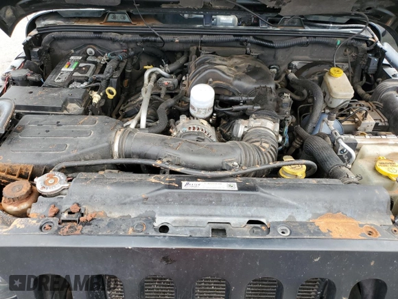 2012 Jeep Wrangler Unlimited Rubicon с VIN 1C4HJWFG4CL103531, выставлен на аукционе Copart как лот 48131665 с пробегом 183 234 миль миль и Списание • Salvage title. История ставок и продаж доступна на DreamBid. Изображение 12.