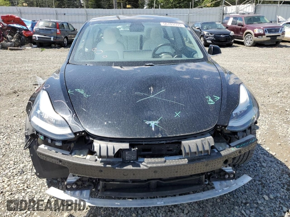 2020 Tesla Model 3 Long Range z VIN 5YJ3E1EBXLF795689, wystawiony jako Copart lot #56703555 z przebiegiem 62 556 mil mil oraz Szkoda całkowita • Salvage title. Historia ofert i sprzedaży dostępna na DreamBid. Obrazek 5.
