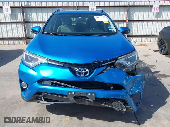 2016 Toyota RAV4 Hybrid XLE with VIN JTMRJREV5GD014170, listed as a IAAI auction lot 41822178 with 89,676 mi miles. Bid and sale history available at carsss.com. Image 17.