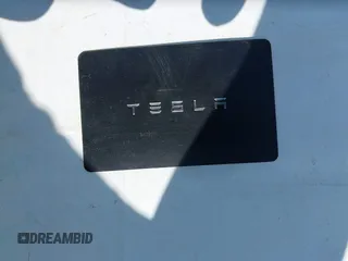 2023 Tesla Model 3 Long Range with VIN 5YJ3E1EBXPF603421, listed as a IAAI auction lot 42105037 with 13,186 mi miles and . Bid and sale history available at DreamBid. Image 11.