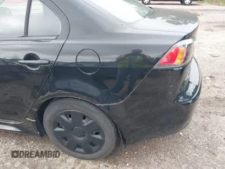2011 Mitsubishi Lancer ES z VIN JA32U2FU0BU043024, wystawiony jako IAAI lot #42367152 z przebiegiem 167 655 mil mil oraz . Historia ofert i sprzedaży dostępna na DreamBid. Obrazek 16.