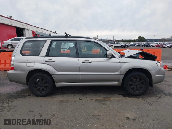2007 Subaru Forester X w/Premium Pkg with VIN JF1SG65607H704317, listed as a IAAI auction lot 41109920 with 110,170 mi miles. Bid and sale history available at carsss.com. Image 12.