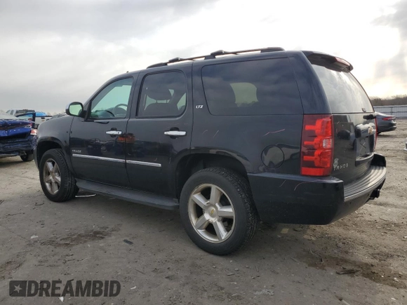 2012 Chevrolet Tahoe LTZ with VIN 1GNSKCE02CR173734, listed as a Copart auction lot 50291805 with 223,962 mi miles and Salvage title. Bid and sale history available at DreamBid. Image 2.