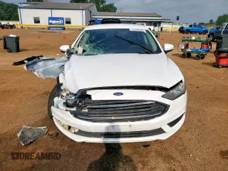 2018 Ford Fusion SE z VIN 3FA6P0LU7JR141756, wystawiony jako Copart lot #57490345 z przebiegiem Nie podano mil oraz Szkoda całkowita • Salvage title. Historia ofert i sprzedaży dostępna na DreamBid. Obrazek 5.