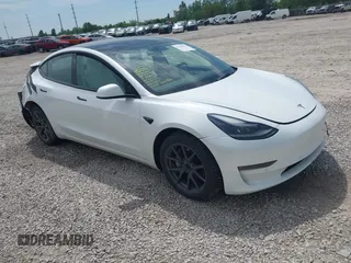 2022 Tesla Model 3 Long Range z VIN 5YJ3E1EB4NF165427, wystawiony jako IAAI lot #42290413 z przebiegiem 73 493 mil mil oraz . Historia ofert i sprzedaży dostępna na DreamBid. Obrazek 1.