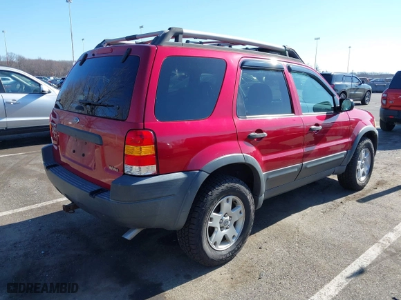2003 Ford Escape XLT Popular 2 with VIN 1FMCU93183KC65571, listed as a IAAI auction lot 41768982 with 150,658 mi miles. Bid and sale history available at carsss.com. Image 4.