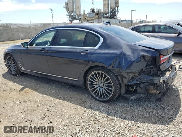 2018 BMW 7 Series 740i with VIN WBA7E2C58JG743126, listed as a Copart auction lot 53843795 with 90,614 mi miles and Salvage title. Bid and sale history available at DreamBid. Image 2.