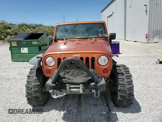 2010 Jeep Wrangler Rubicon with VIN 1J4BA6D12AL186887, listed as a Copart auction lot 57902545 with Not provided miles and Salvage title. Bid and sale history available at DreamBid. Image 13.