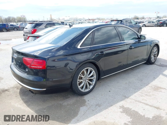 2012 Audi A8 L with VIN WAURVAFD5CN038949, listed as a IAAI auction lot 41914575 with 85,634 mi miles. Bid and sale history available at carsss.com. Image 4.