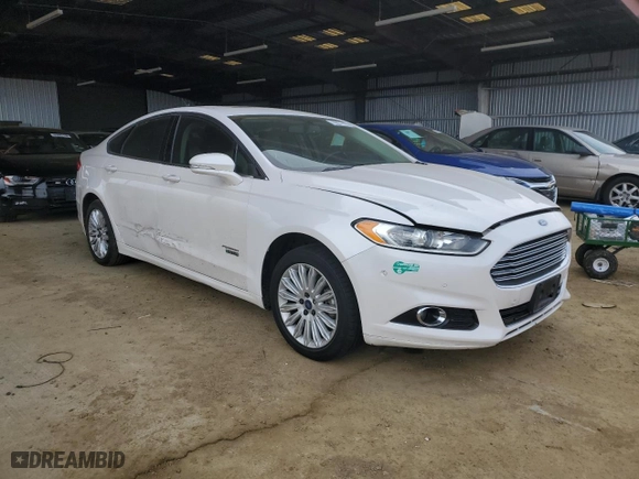 2016 Ford Fusion Energi Titanium with VIN 3FA6P0SU0GR305536, listed as a Copart auction lot 85931474 with 221,786 mi miles and Salvage Title. Bid and sale history available at carsss.com. Image 4.