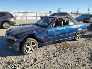 1999 BMW 3 Series 323ic with VIN WBABJ7338XEA19106, listed as a Copart auction lot 74781174 with 0 mi miles and Non Repairable. Bid and sale history available at carsss.com. Image 1.