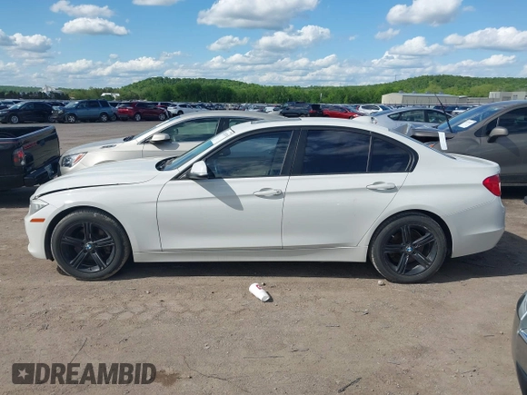 2014 BMW 3 Series 328i with VIN WBA3A5C5XEJ463938, listed as a IAAI auction lot 42103330 with 194,263 mi miles and . Bid and sale history available at DreamBid. Image 14.