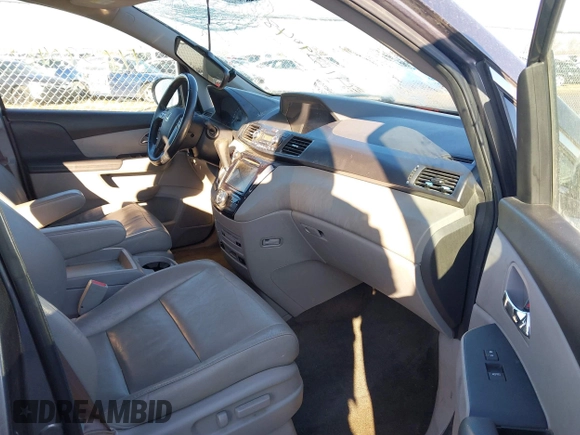 2014 Honda Odyssey EX-L with VIN 5FNRL5H61EB079739, listed as a IAAI auction lot 41659048 with 137,012 mi miles and . Bid and sale history available at carsss.com. Image 5.