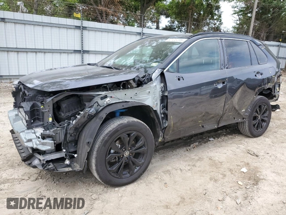 2023 Toyota RAV4 Hybrid XSE with VIN 4T3E6RFV1PU117863, listed as a Copart auction lot 60135555 with 28,248 mi miles and Salvage title. Bid and sale history available at DreamBid. Image 1.