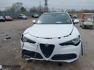 2020 Alfa Romeo Stelvio Ti with VIN ZASPAKBN6L7C92398, listed as a IAAI auction lot 41924883 with 73,683 mi miles. Bid and sale history available at carsss.com. Image 12.