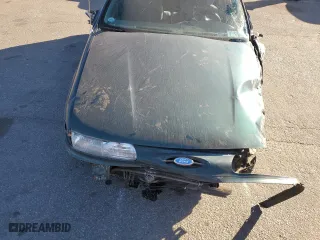 1994 Ford Taurus GL with VIN 1FALP57U8RG288147, listed as a Copart auction lot 84584784 with 154,187 mi miles and Non Repairable. Bid and sale history available at carsss.com. Image 11.