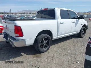 2015 Ram 1500 Big Horn with VIN 1C6RR6LM9FS676093, listed as a IAAI auction lot 41837207 with 132,685 mi miles and . Bid and sale history available at DreamBid. Image 4.