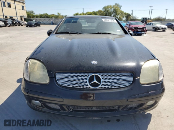 2004 Mercedes-Benz SLK-Class with VIN WDBKK65F24F306069, listed as a Copart auction lot 68791864 with 99,835 mi miles and Salvage Title. Bid and sale history available at carsss.com. Image 5.