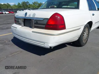 2006 Mercury Grand Marquis LS Premium z VIN 2MEFM75V46X614439, wystawiony jako IAAI lot #42319947 z przebiegiem 125 715 mil mil oraz . Historia ofert i sprzedaży dostępna na DreamBid. Obrazek 14.