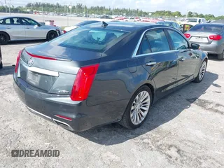 2014 Cadillac CTS Performance RWD with VIN 1G6AS5S36E0151499, listed as a IAAI auction lot 41945902 with 133,858 mi miles and . Bid and sale history available at DreamBid. Image 4.