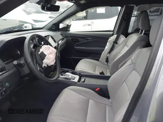 2023 Honda Passport Elite with VIN 5FNYF8H02PB029127, listed as a IAAI auction lot 41166484 with 16,200 mi miles and . Bid and sale history available at DreamBid. Image 5.