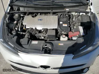 2021 Toyota Prius L Eco with VIN JTDKAMFU5M3133915, listed as a Copart auction lot 47015075 with 56,133 mi miles and Salvage Title. Bid and sale history available at carsss.com. Image 12.