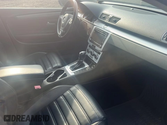 2013 Volkswagen CC R-Line with VIN WVWBP7AN1DE571321, listed as a Copart auction lot 70648784 with 122,061 mi miles and Clean Title. Bid and sale history available at carsss.com. Image 5.