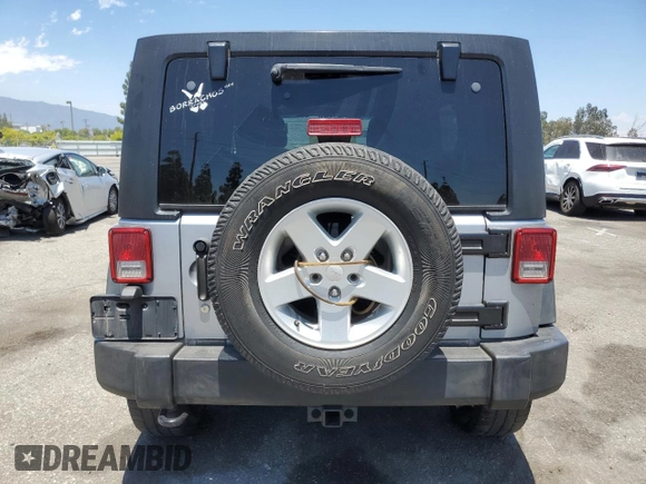 2014 Jeep Wrangler Unlimited Sport with VIN 1C4HJWDG1EL221302, listed as a Copart auction lot 63331015 with 213,912 mi miles and Salvage title. Bid and sale history available at DreamBid. Image 6.