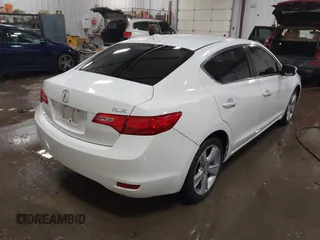2014 Acura ILX z VIN 19VDE1F35EE006166, wystawiony jako IAAI lot #41320730 z przebiegiem 203 151 mil mil oraz . Historia ofert i sprzedaży dostępna na DreamBid. Obrazek 4.