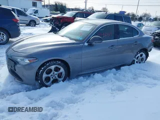 2019 Alfa Romeo Giulia with VIN ZARFANAN6K7601511, listed as a IAAI auction lot 41440169 with 53,104 mi miles. Bid and sale history available at carsss.com. Image 2.