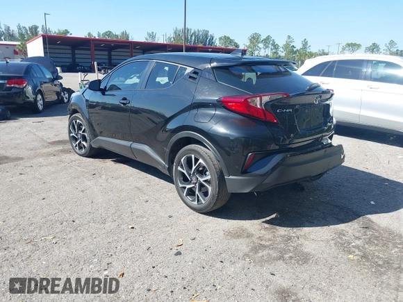 2021 Toyota C-HR LE with VIN NMTKHMBX7MR126165, listed as a IAAI auction lot 41848045 with 26,882 mi miles. Bid and sale history available at carsss.com. Image 3.