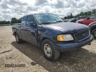 2003 Ford F-150 XL with VIN 2FTRX17WX3CB09775, listed as a Copart auction lot 56696415 with 226,460 mi miles and Salvage title. Bid and sale history available at DreamBid. Image 4.