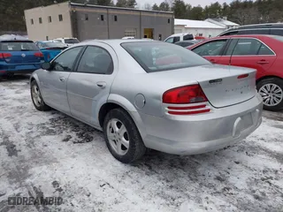 2004 Dodge Stratus SXT with VIN 1B3EL46X44N210281, listed as a IAAI auction lot 41546221 with 121,902 mi miles. Bid and sale history available at carsss.com. Image 3.