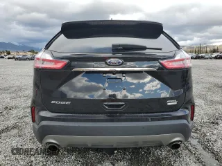 2019 Ford Edge SEL with VIN 2FMPK3J92KBC74322, listed as a Copart auction lot 48760065 with 62,949 mi miles and Salvage title. Bid and sale history available at DreamBid. Image 6.