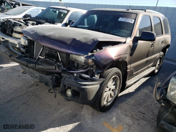 2002 GMC Yukon Denali with VIN 1GKEK63U62J340241, listed as a Copart auction lot 71122174 with 259,297 mi miles and Salvage Title. Bid and sale history available at carsss.com. Image 1.