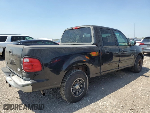 2003 Ford F-150 XLT with VIN 1FTRW07623KD82847, listed as a Copart auction lot 50303265 with 156,781 mi miles and Clean Title. Bid and sale history available at carsss.com. Image 3.