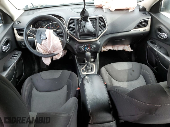 2015 Jeep Cherokee Sport with VIN 1C4PJLAB8FW761989, listed as a Copart auction lot 56869675 with 181,347 mi miles and Salvage title. Bid and sale history available at DreamBid. Image 8.